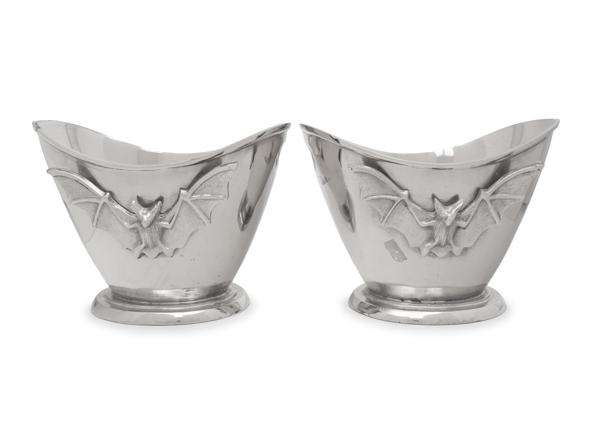 A Pair of Silvered Metal Wine Coolers with Bat Motif