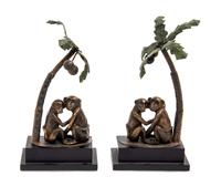 A Pair of Cast Metal and Tole Table Ornaments Height 11 1/2 inches.