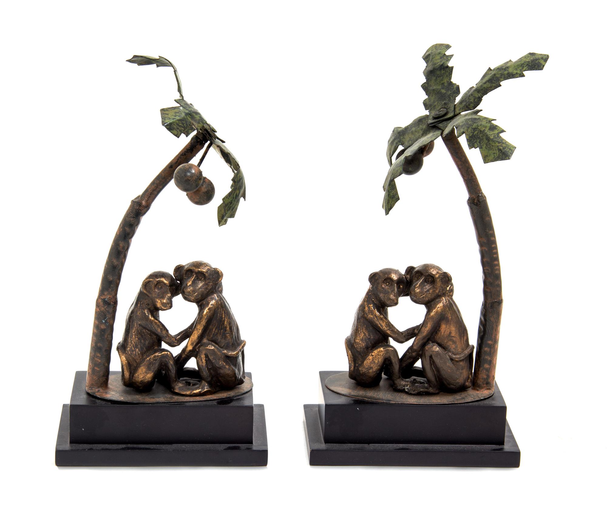 A Pair of Cast Metal and Tole Table Ornaments Height 11 1/2 inches.