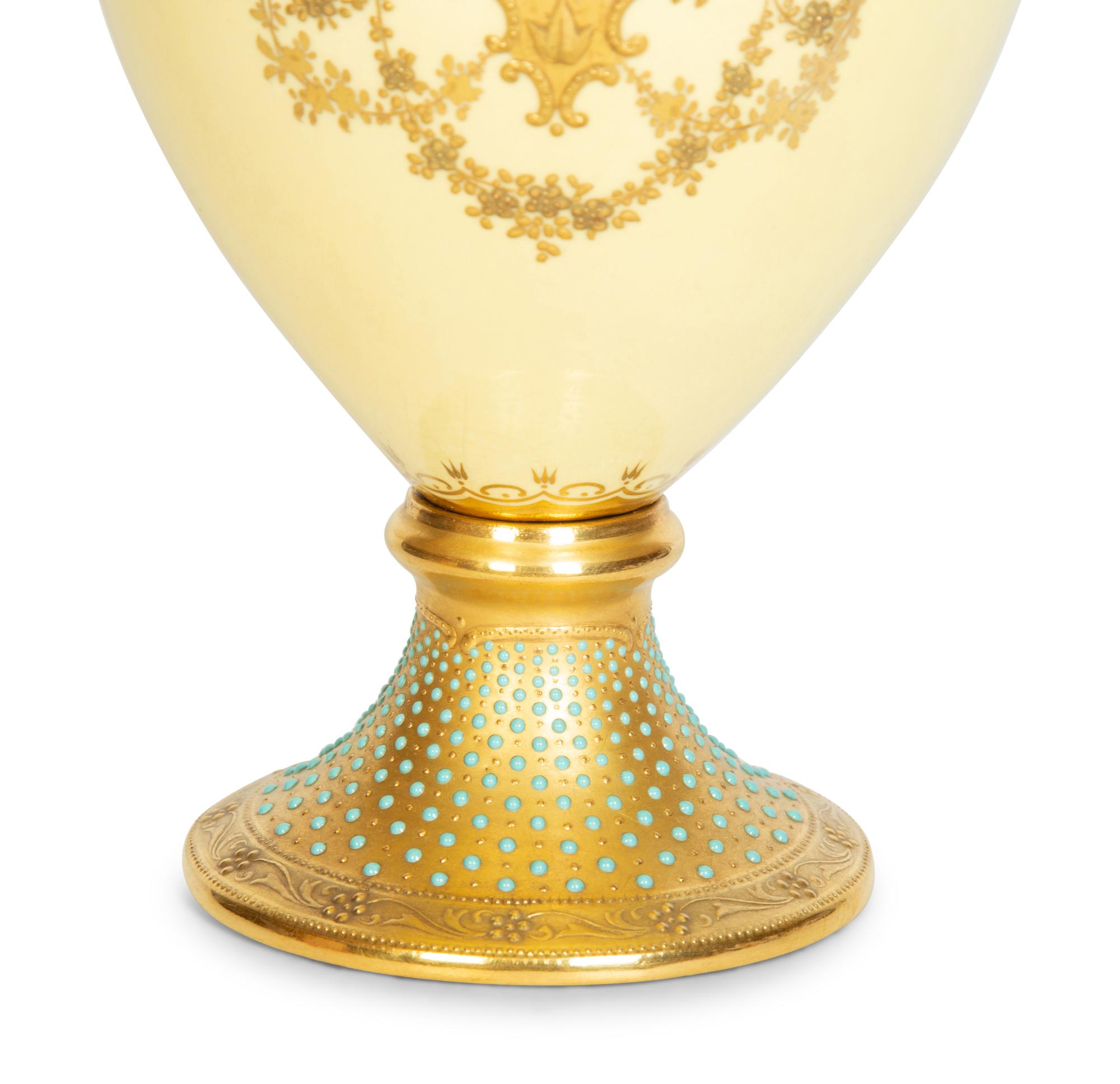A Coalport Gilt Decorated Porcelain Ewer
