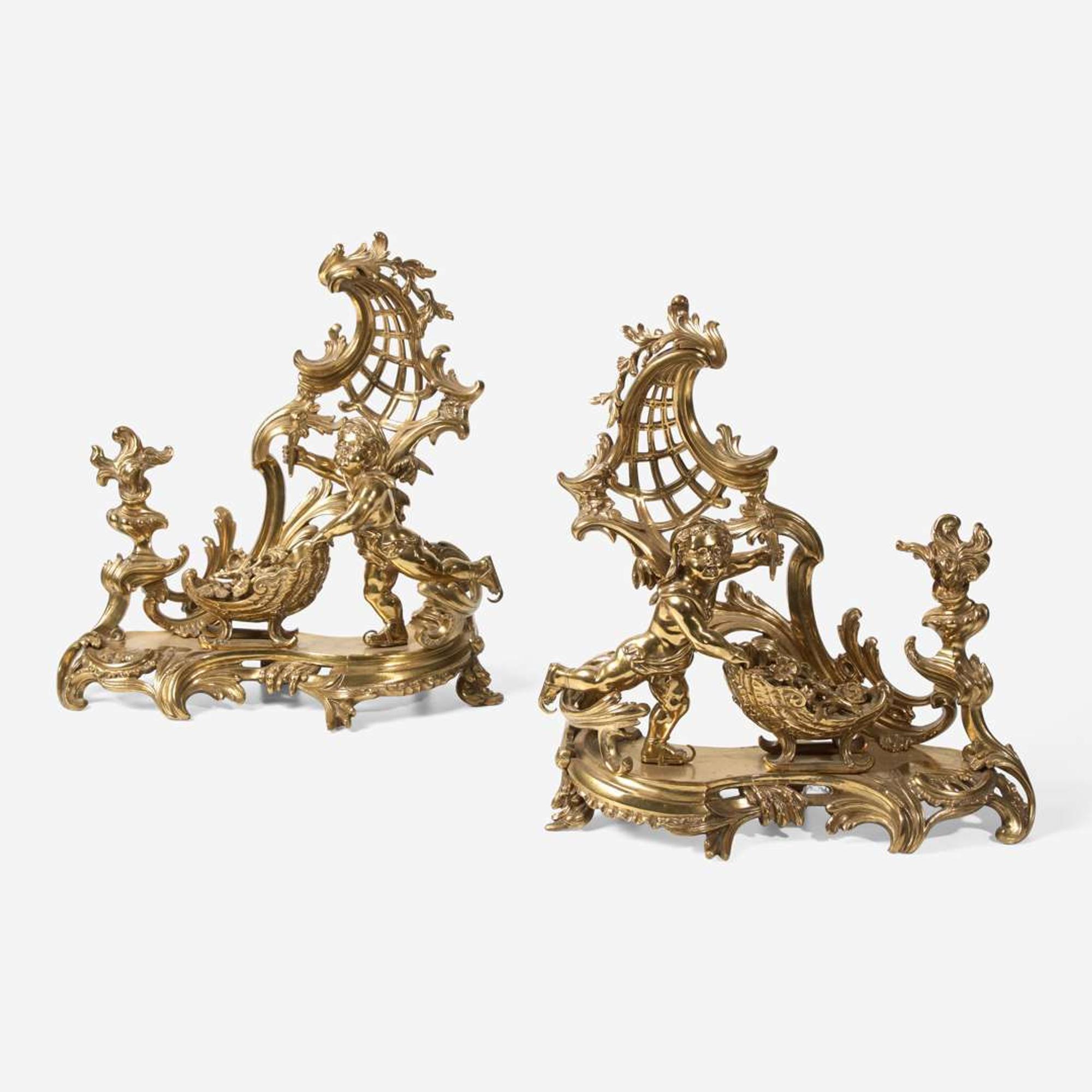 A pair of Louis XVI style gilt bronze chenets late 19th century