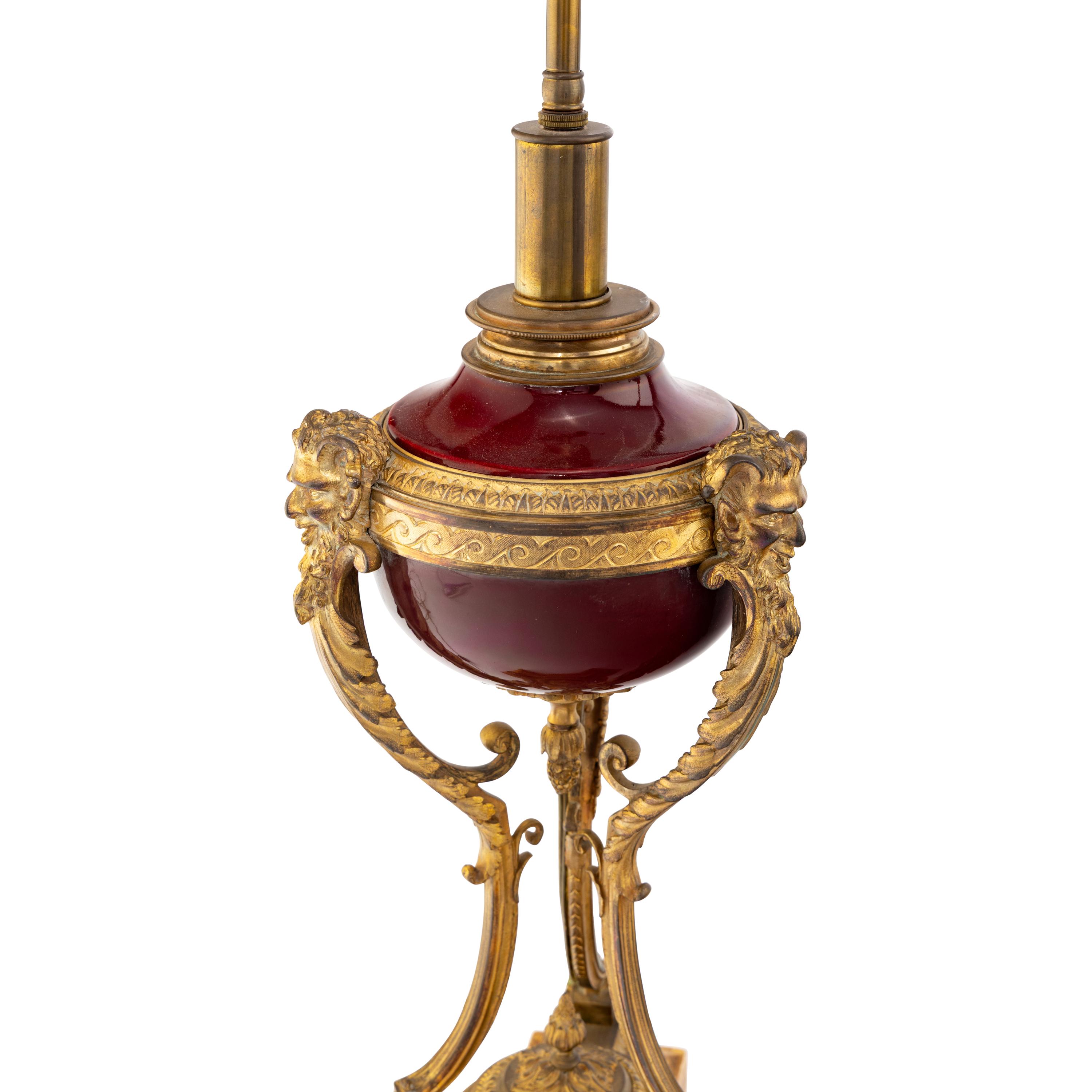 A Pair of Louis XVI Style Gilt Bronze Mounted Porcelain Urns