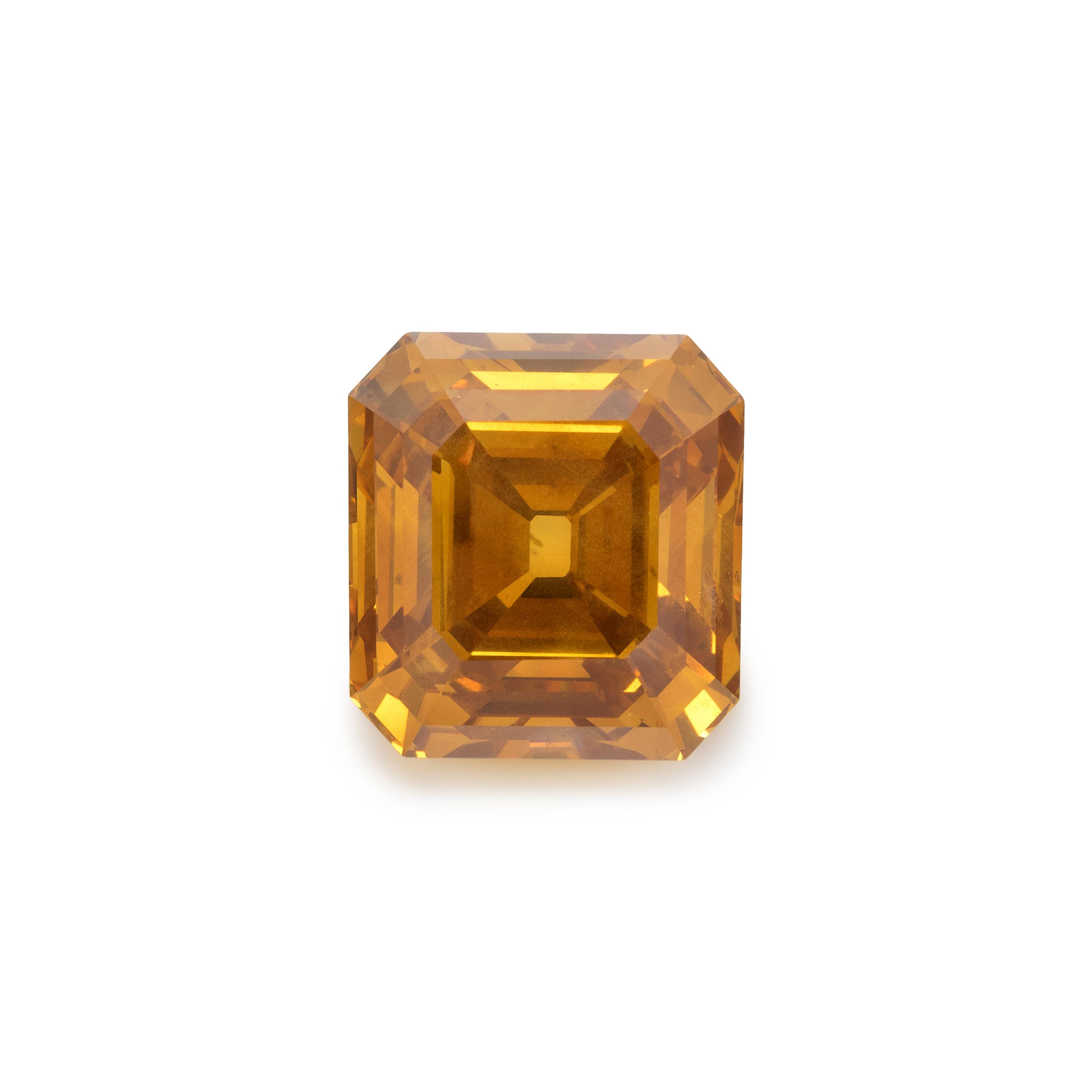 6.67 CARAT EMERALD CUT FANCY DEEP BROWNISH ORANGY YELLOW DIAMOND