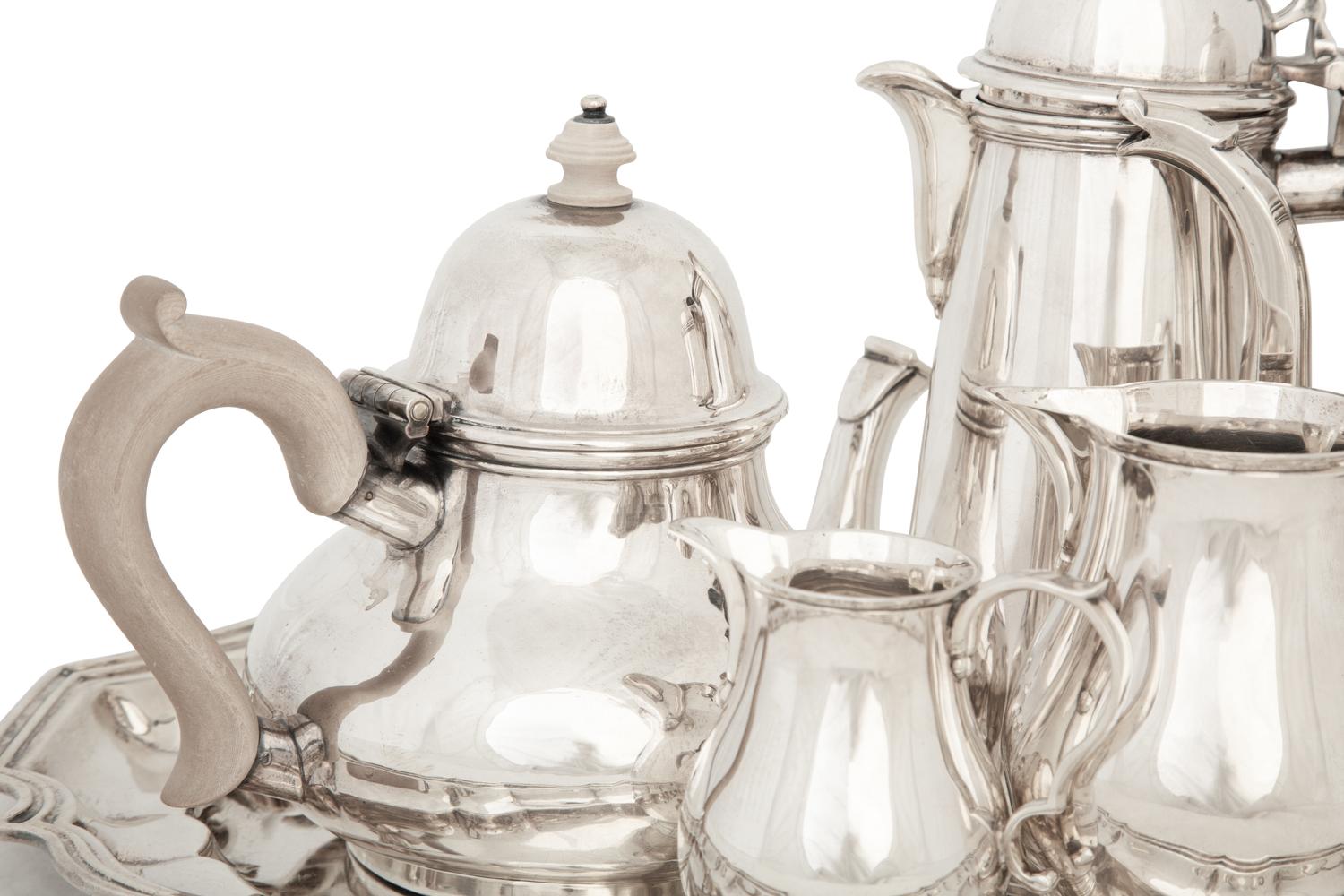 An English Queen Anne Style Silver Five-Piece Tea and Coffee Service