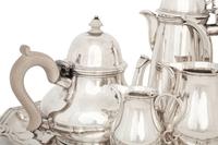 An English Queen Anne Style Silver Five-Piece Tea and Coffee Service