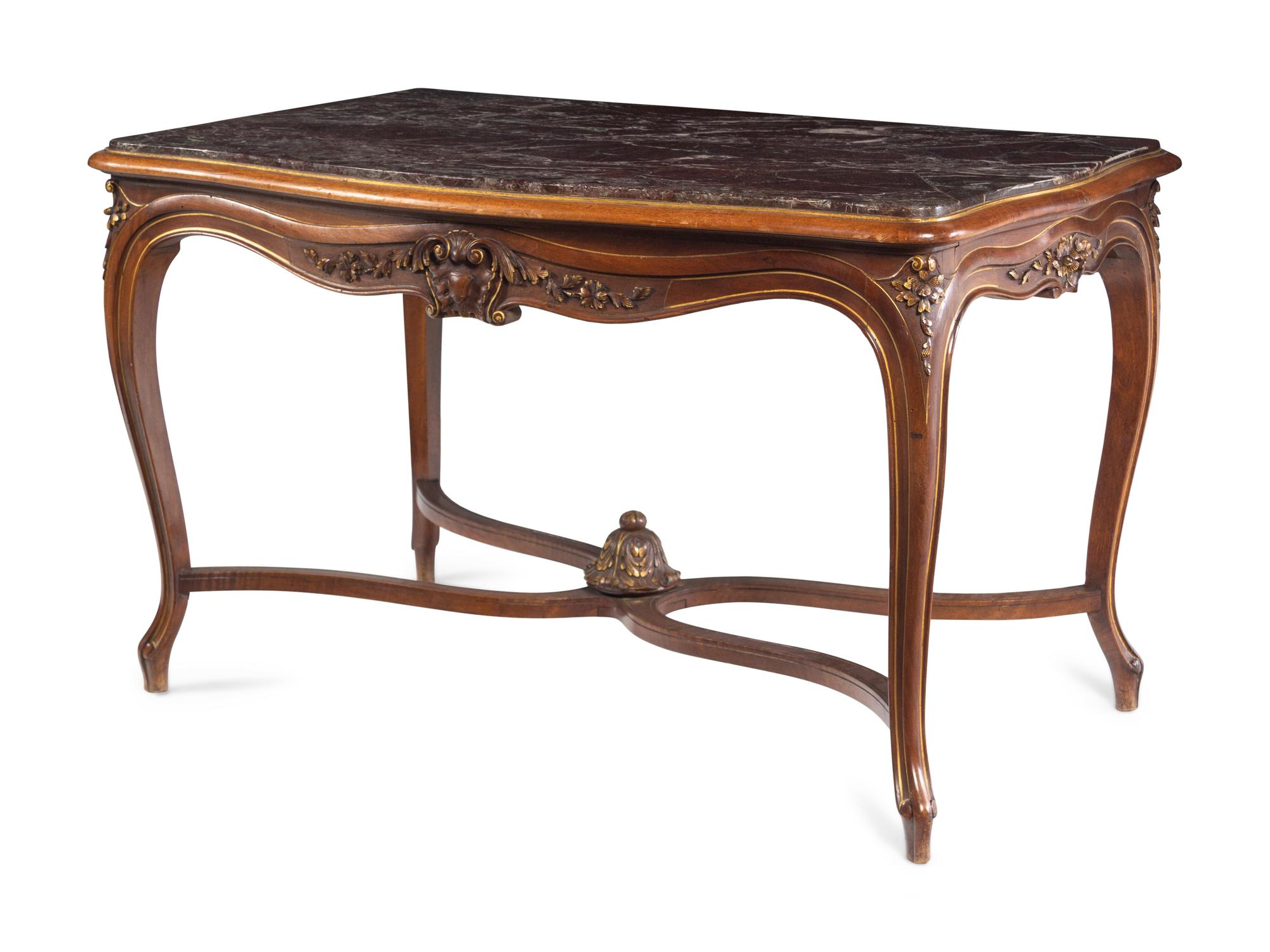 An Italian Louis XV Style Carved Walnut Marble-Inset Serpentine-Top Center Table