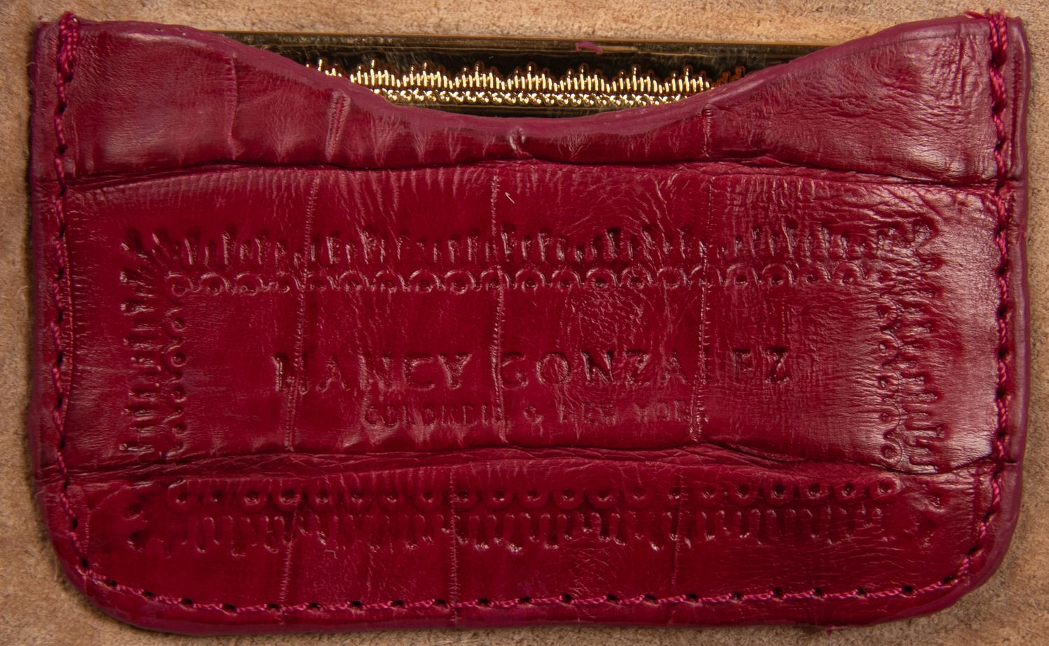 NANCY GONZALEZ, TWO HANDBAGS