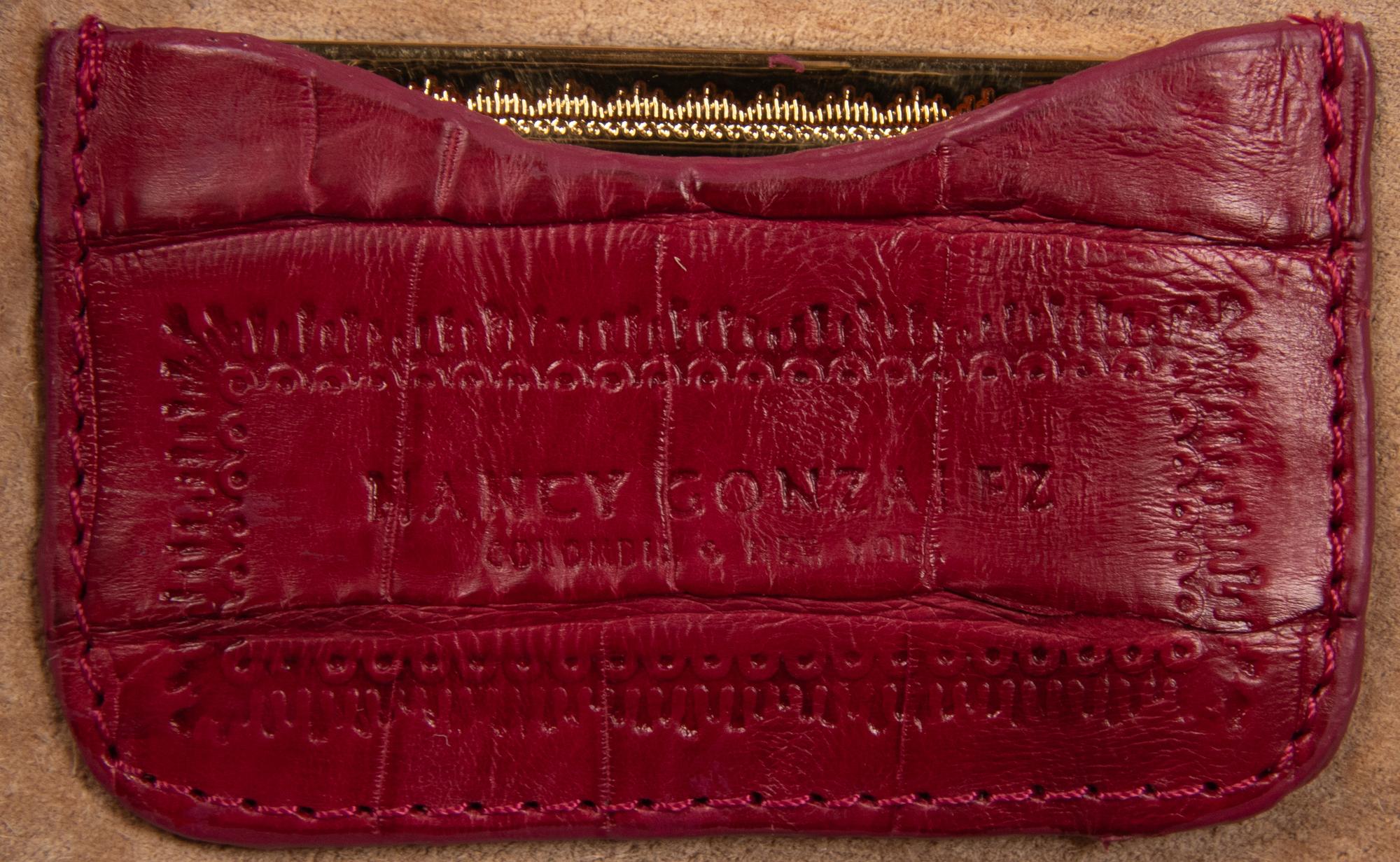 NANCY GONZALEZ, TWO HANDBAGS