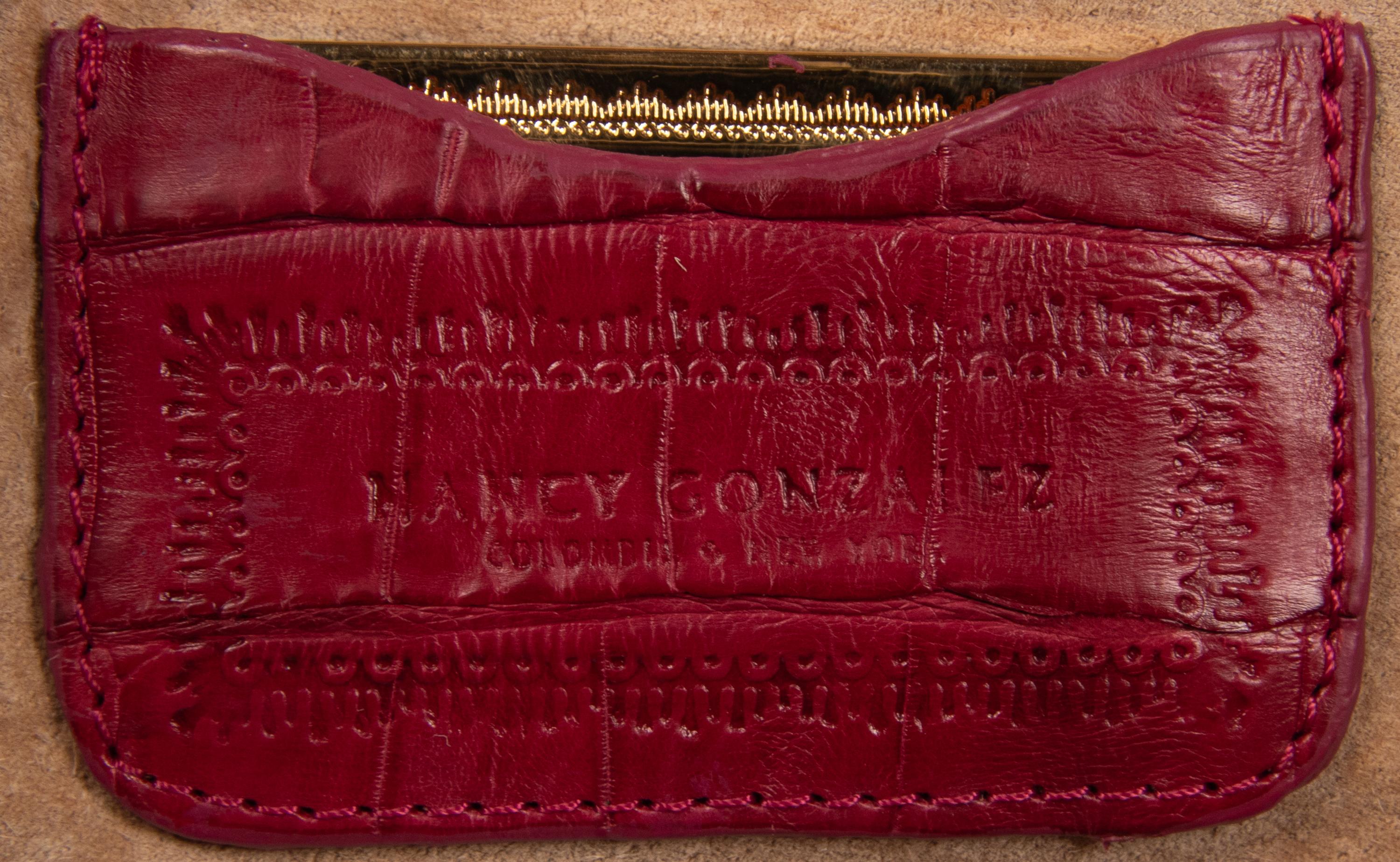 NANCY GONZALEZ, TWO HANDBAGS