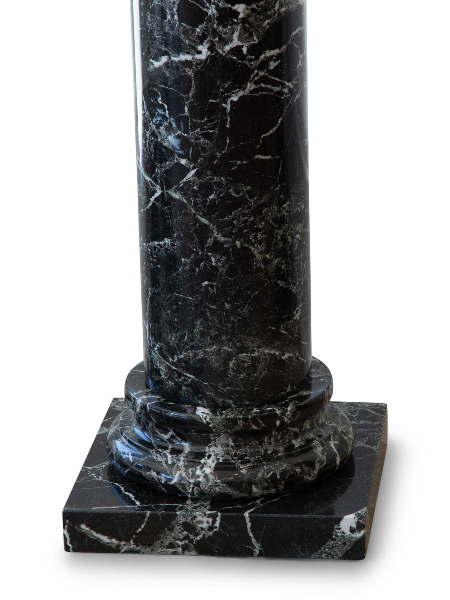 A Pair of Black Marble Pedestals
