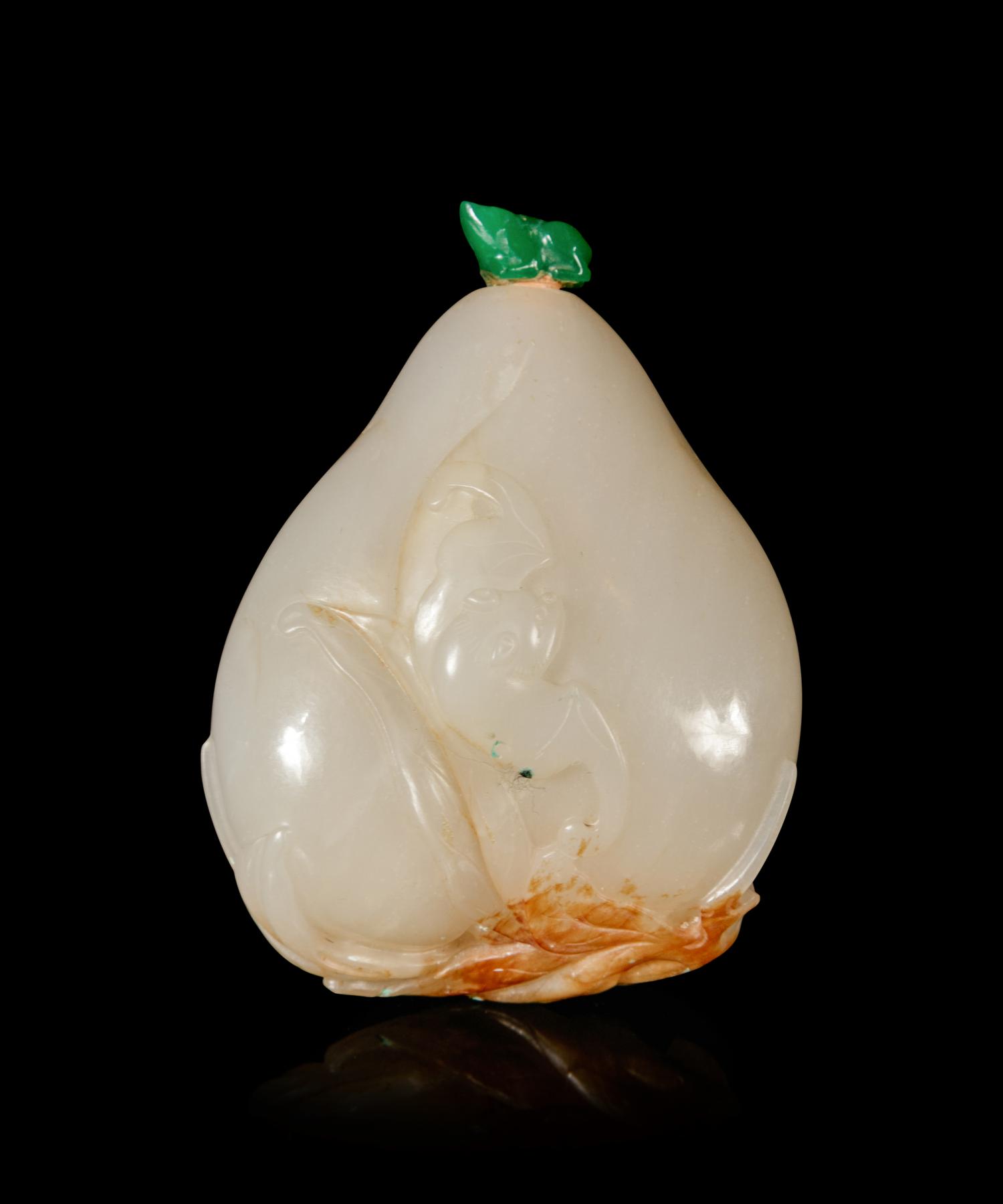 A Russet and White Jade 'Peach and Bat' Snuff Bottle