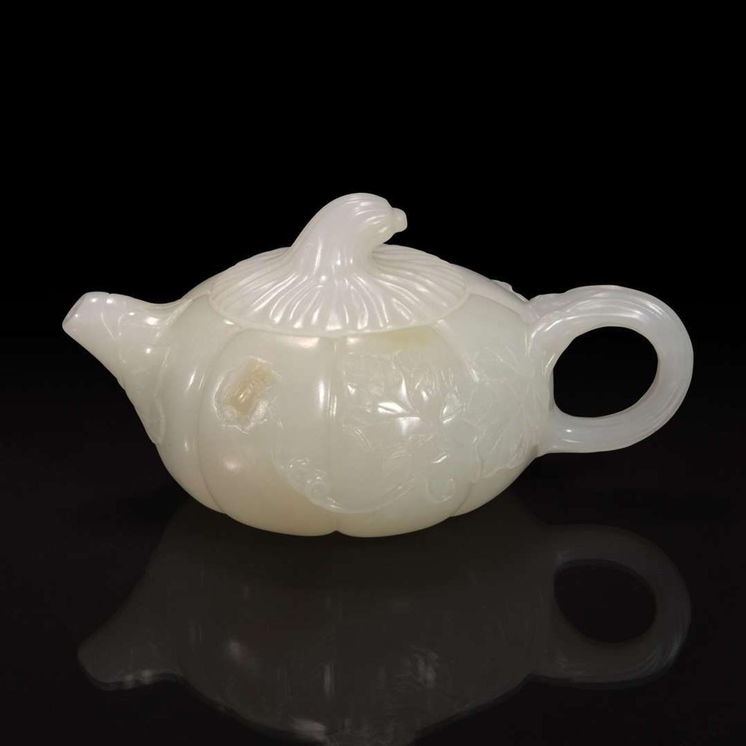 A small Chinese white jade melon-form teapot 瓜形玉茶壶