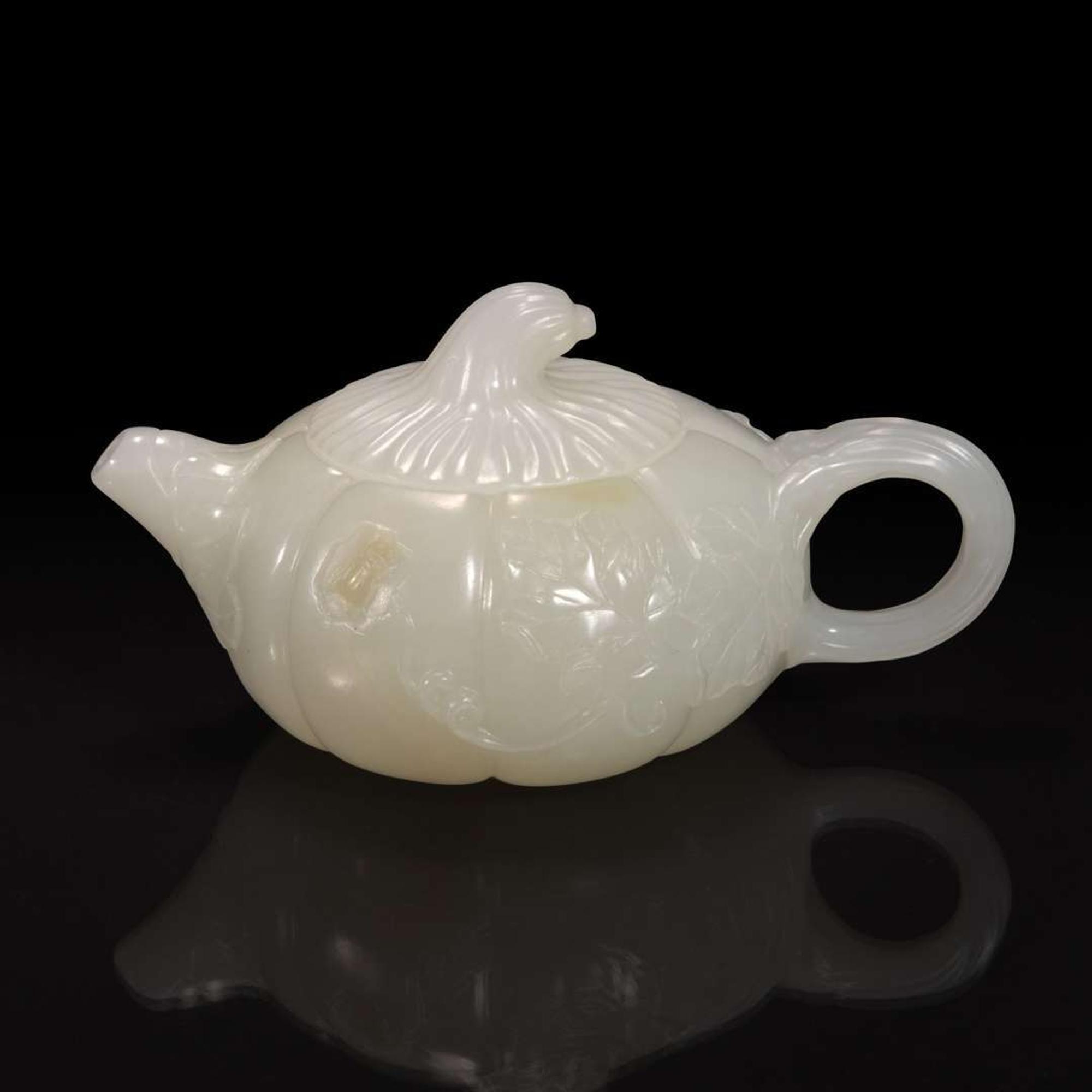 A small Chinese white jade melon-form teapot 瓜形玉茶壶