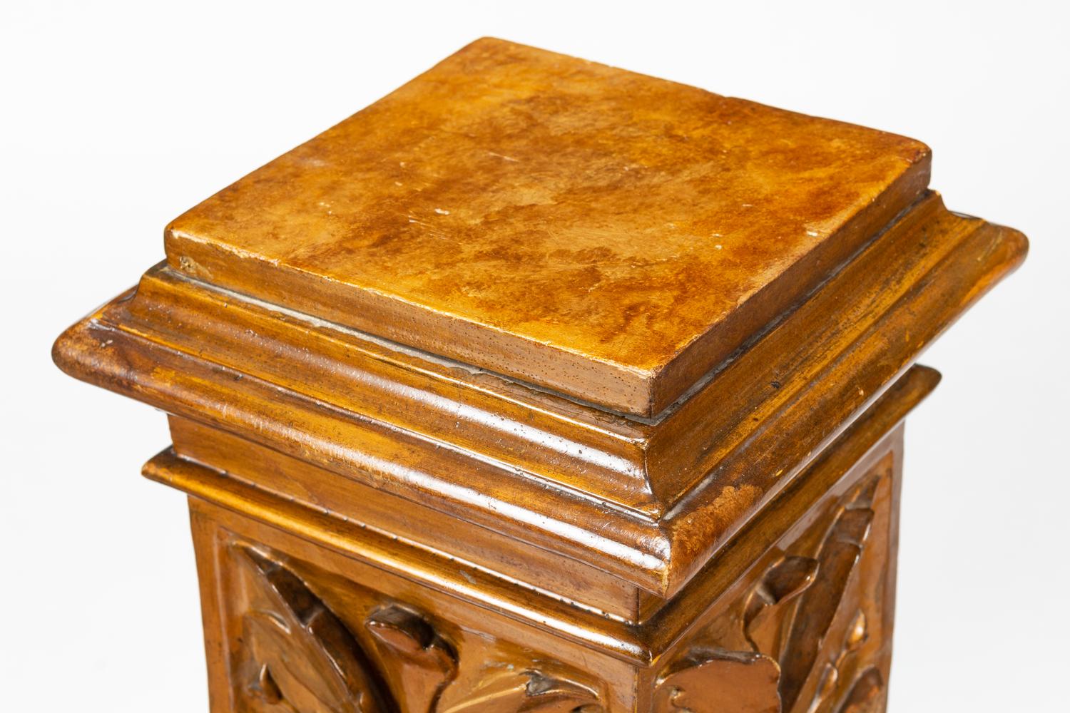 A Pair of Continental Faux Marble Painted and Gilt Pedestals with Putto Masks