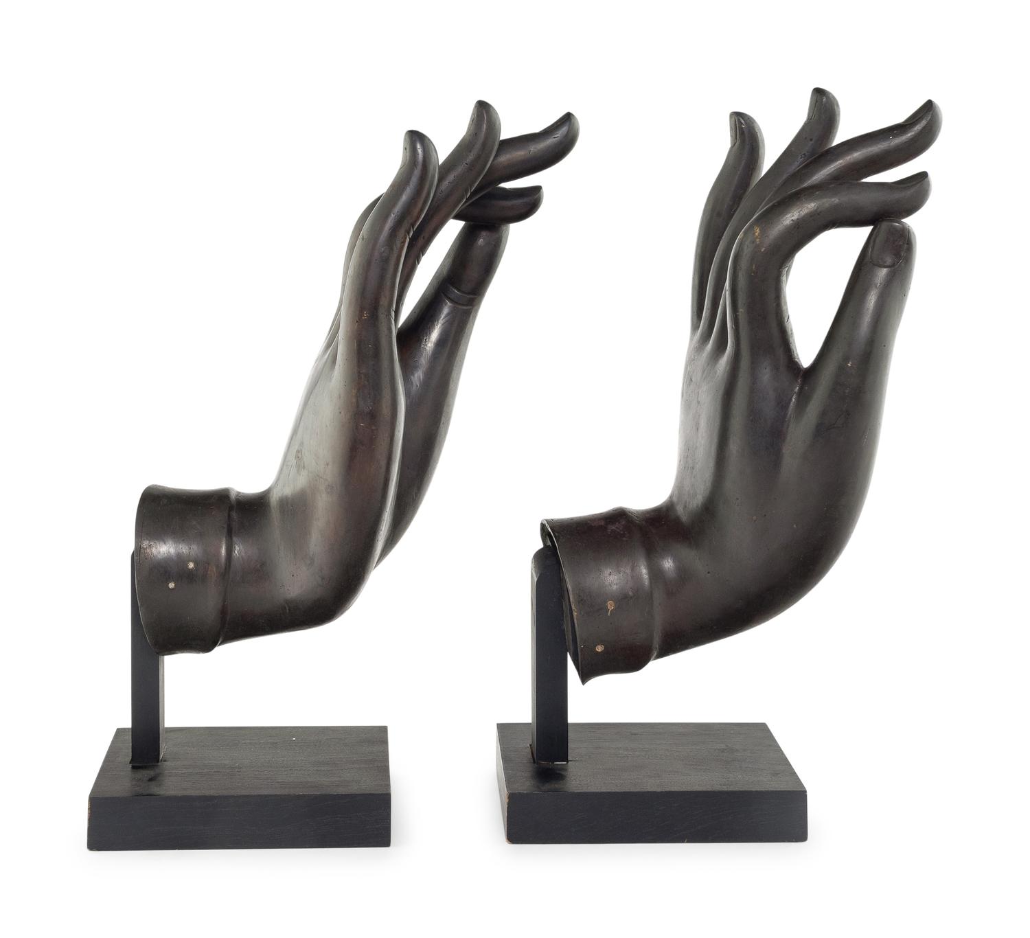 A Large Pair of Chinese Lacquered Bronze Buddha Hands