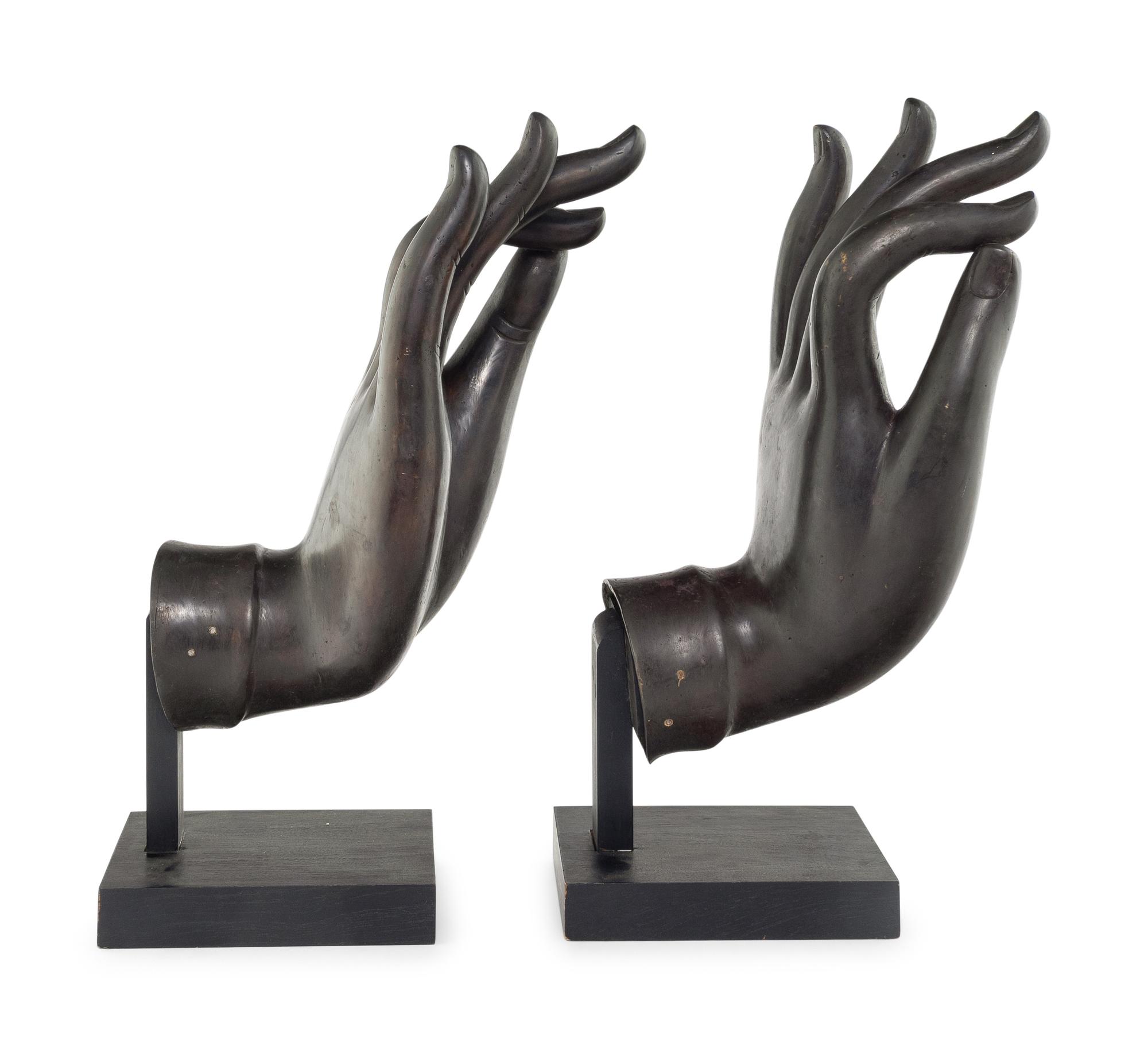 A Large Pair of Chinese Lacquered Bronze Buddha Hands