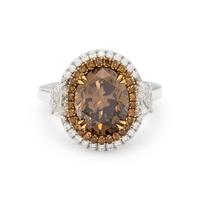 FANCY DARK YELLOWISH BROWN DIAMOND AND DIAMOND RING