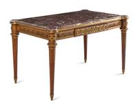 A Louis XVI Style Gilt Bronze Mounted Mahogany Marble-Top Center Table