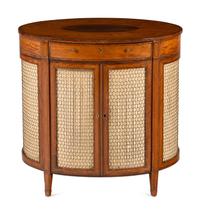 A George III Satinwood and Mahogany Oval Cabinet