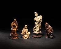 Four Chinese Carved Soapstone Figures of Immortals
