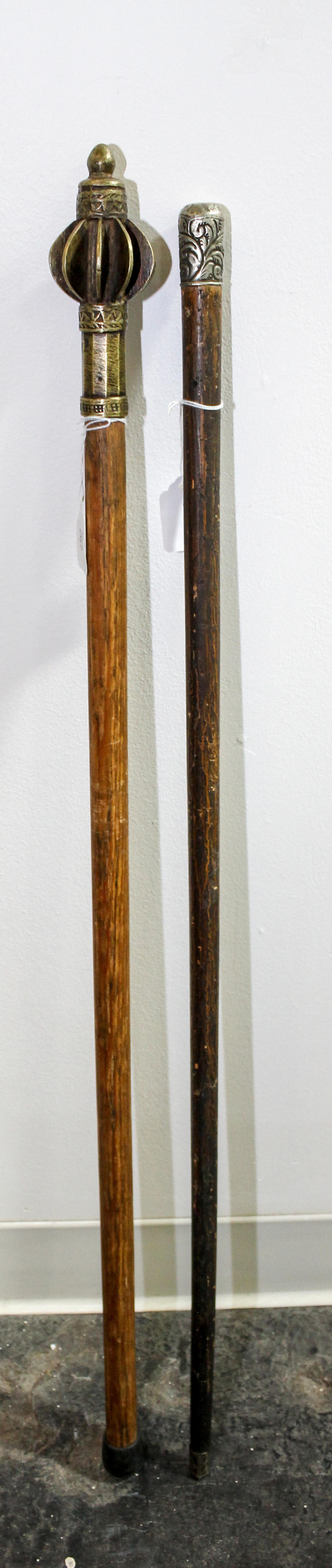 A Group of Two Canes Length of longest 35 1/4 inches.