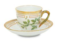 A Set of Nine Royal Copenhagen Flora Danica Porcelain Teacups and Saucers