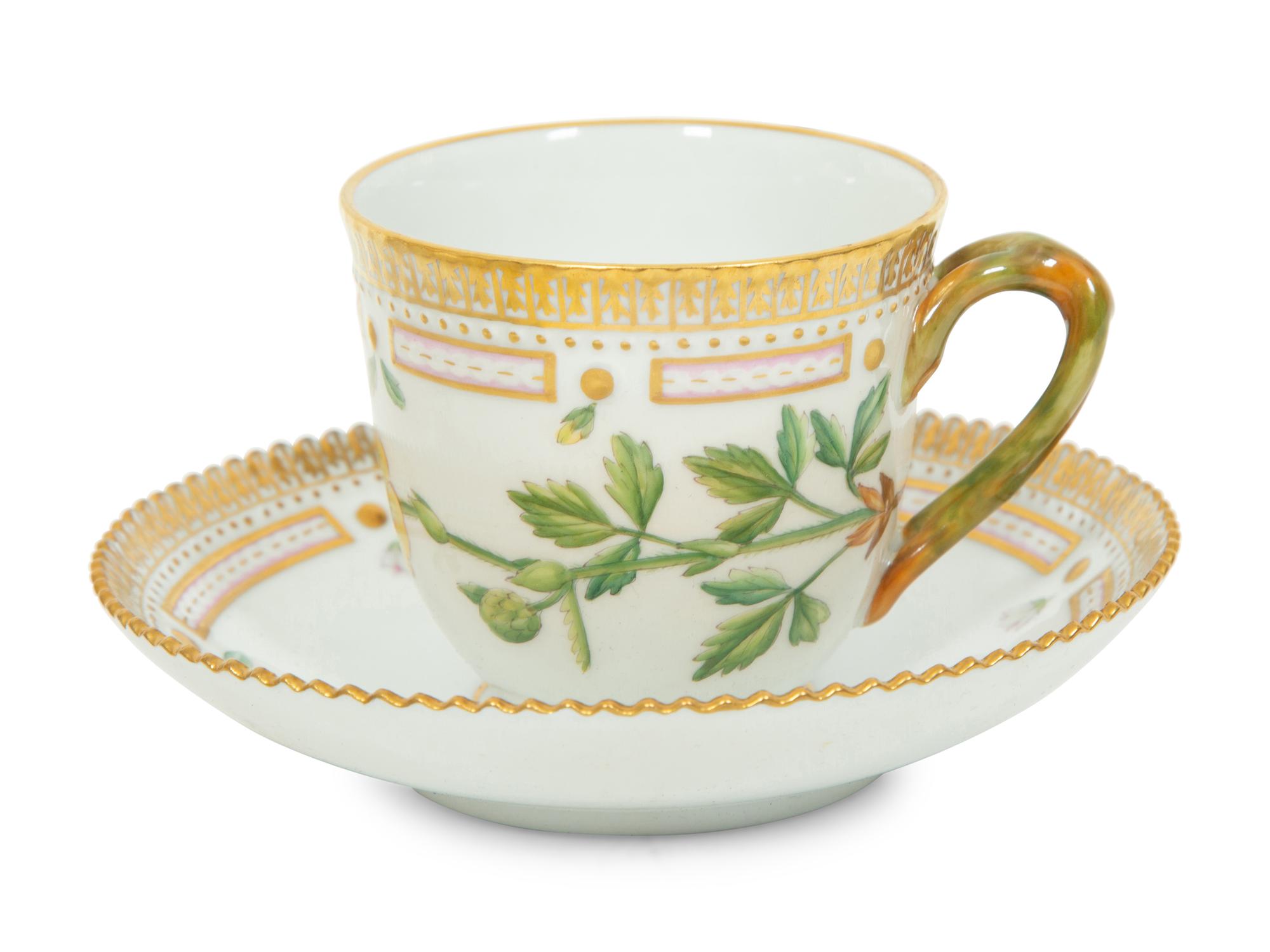 A Set of Nine Royal Copenhagen Flora Danica Porcelain Teacups and Saucers