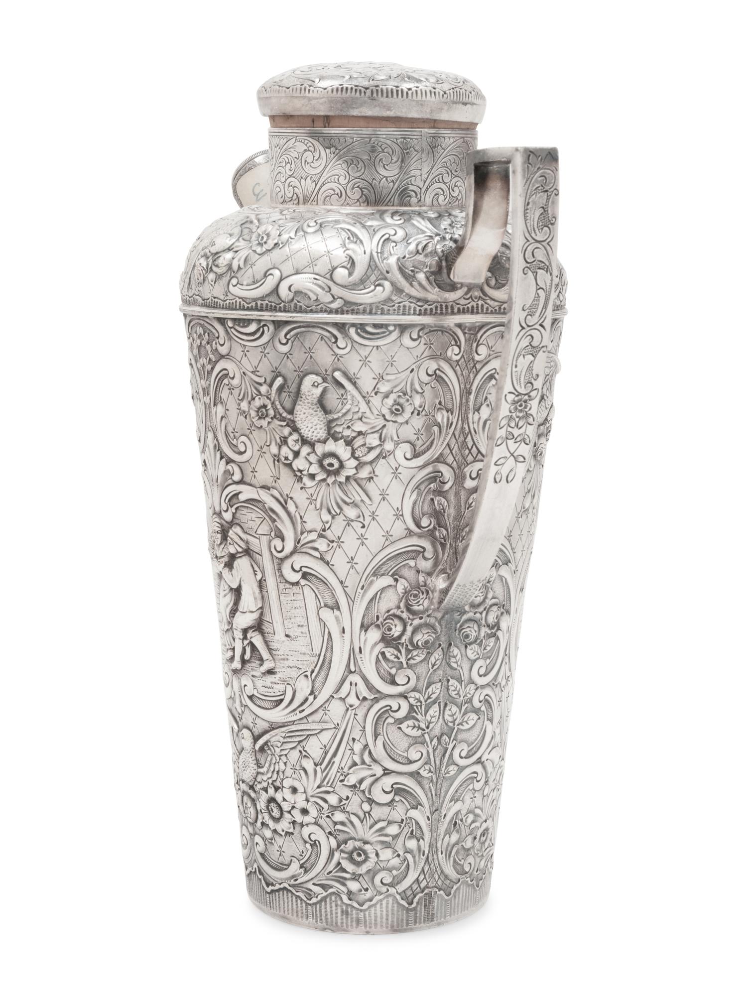 A Repoussé-Decorated Silver-Plate Cocktail Shaker