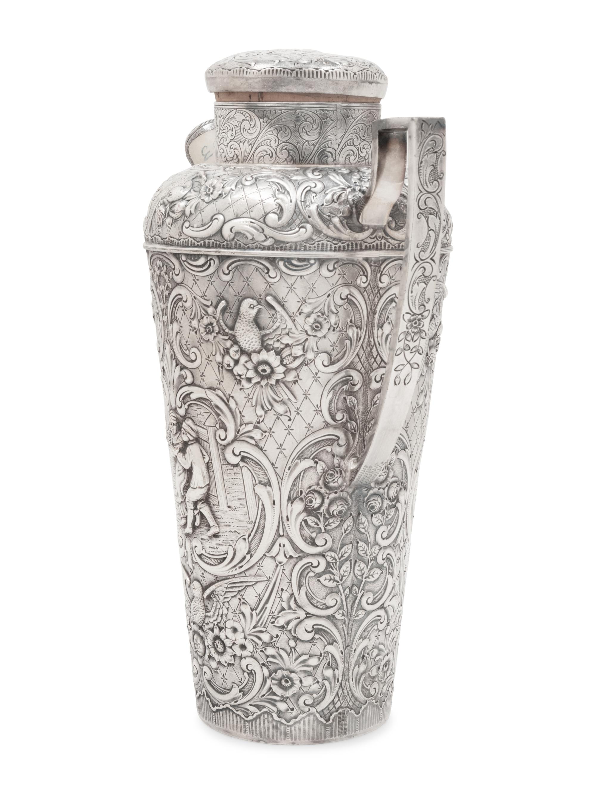 A Repoussé-Decorated Silver-Plate Cocktail Shaker
