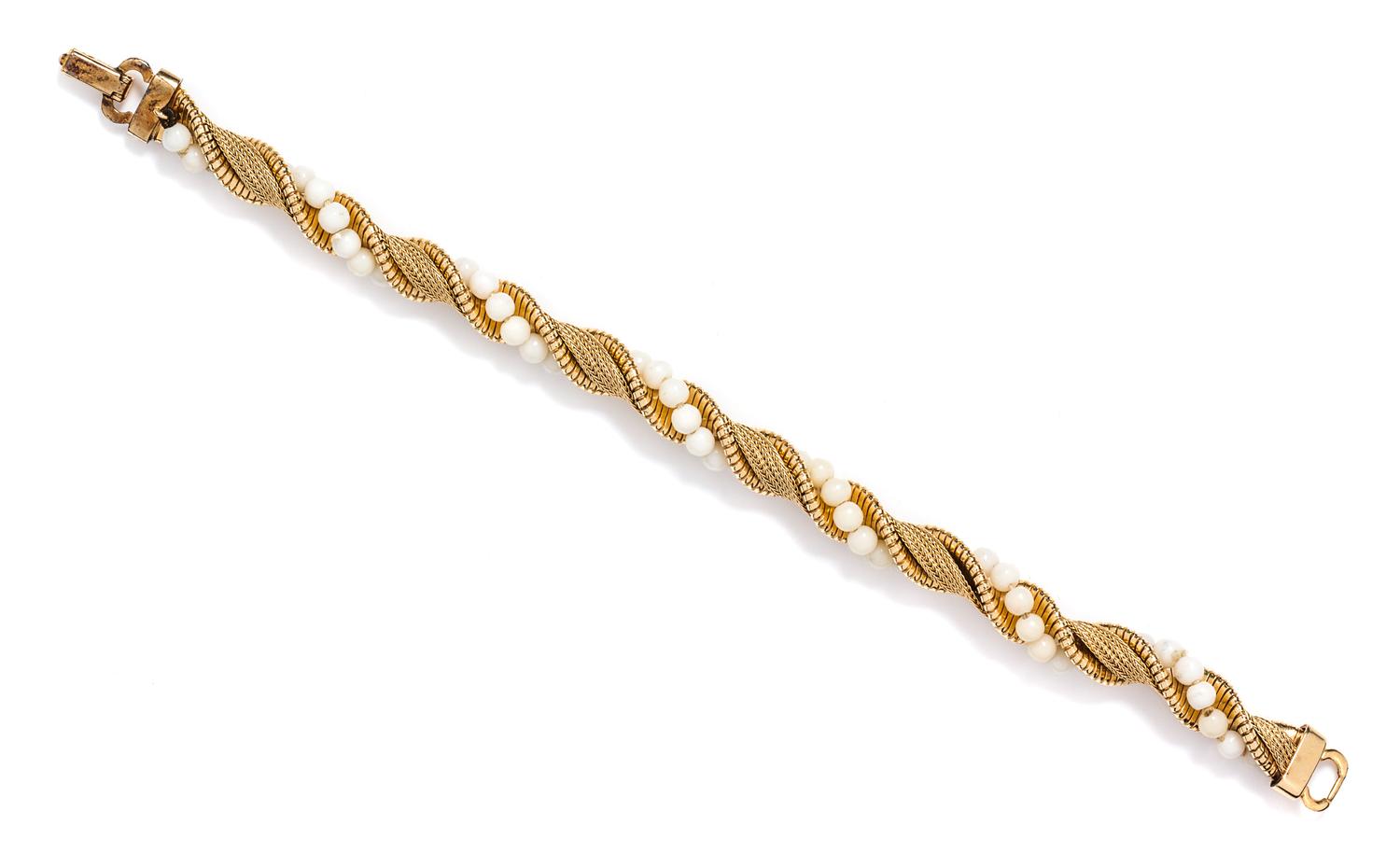 A 14 Karat Yellow Gold and White Coral Bracelet, Forstner, 17.10 dwts.