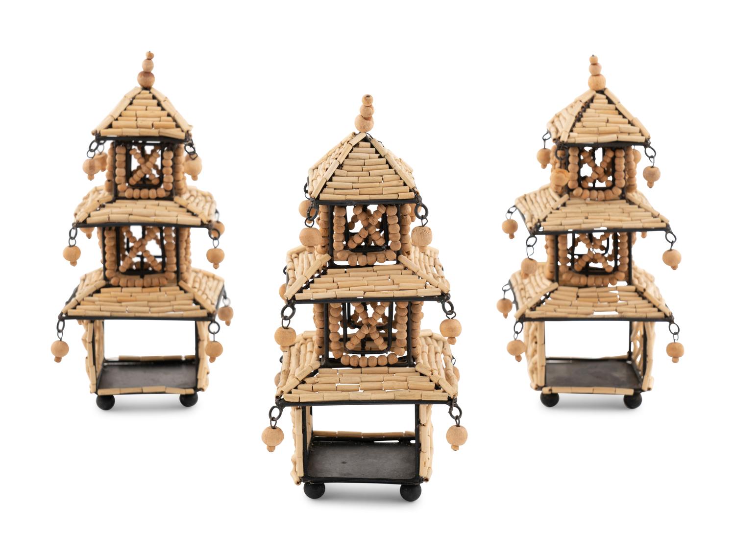 A Set of Eight Beaded Pagoda Napkin Rings