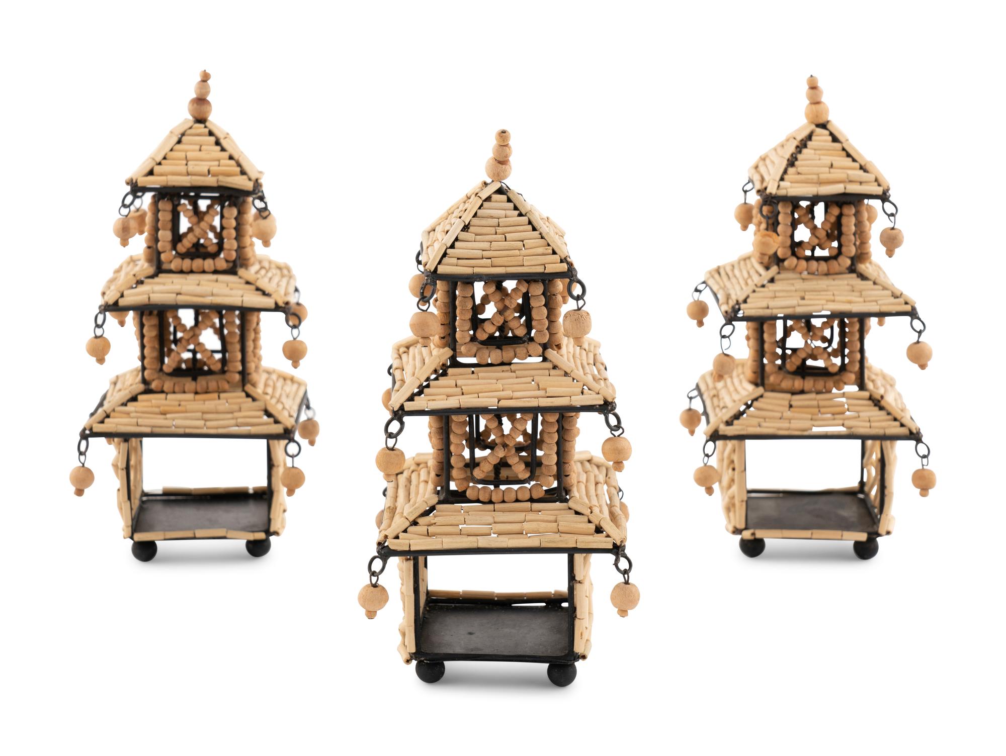 A Set of Eight Beaded Pagoda Napkin Rings