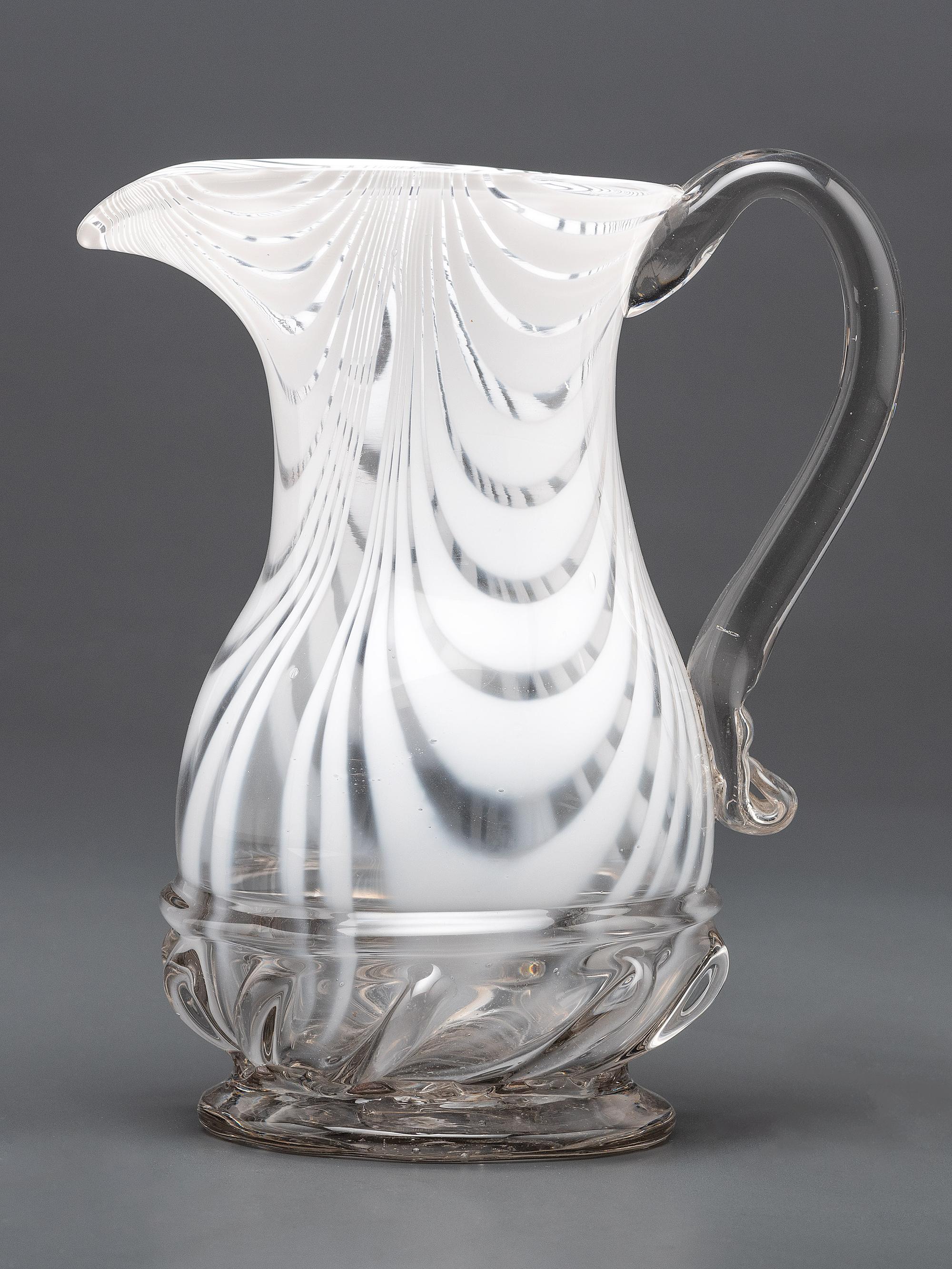A New Jersey Blown-Glass Pitcher in Clear with White Swirls