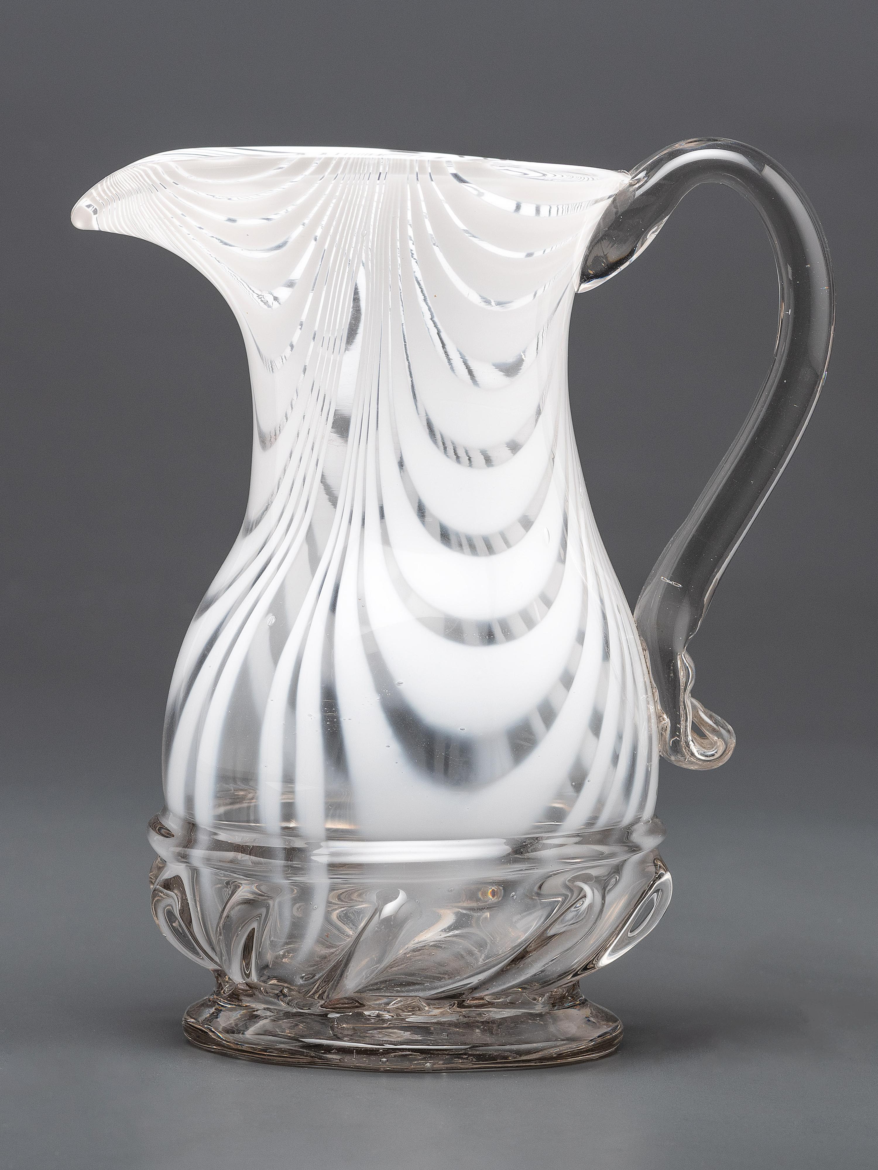 A New Jersey Blown-Glass Pitcher in Clear with White Swirls