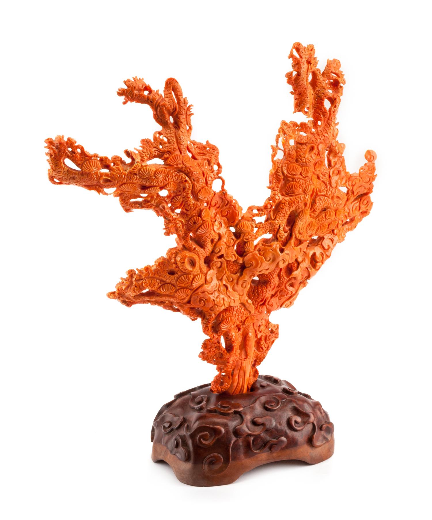 A Chinese Carved Coral Figural Group Height 12 1/2 x width 13 1/2 inches.