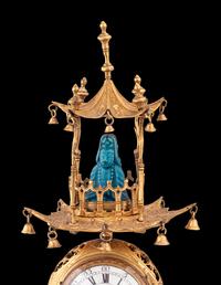 A Louis XV Style Gilt Bronze and Chinese Porcelain Mounted Pagoda-Form Mantel Clock