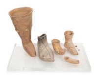 A Group of Earthenware Shoe-Form Drinking Vessels