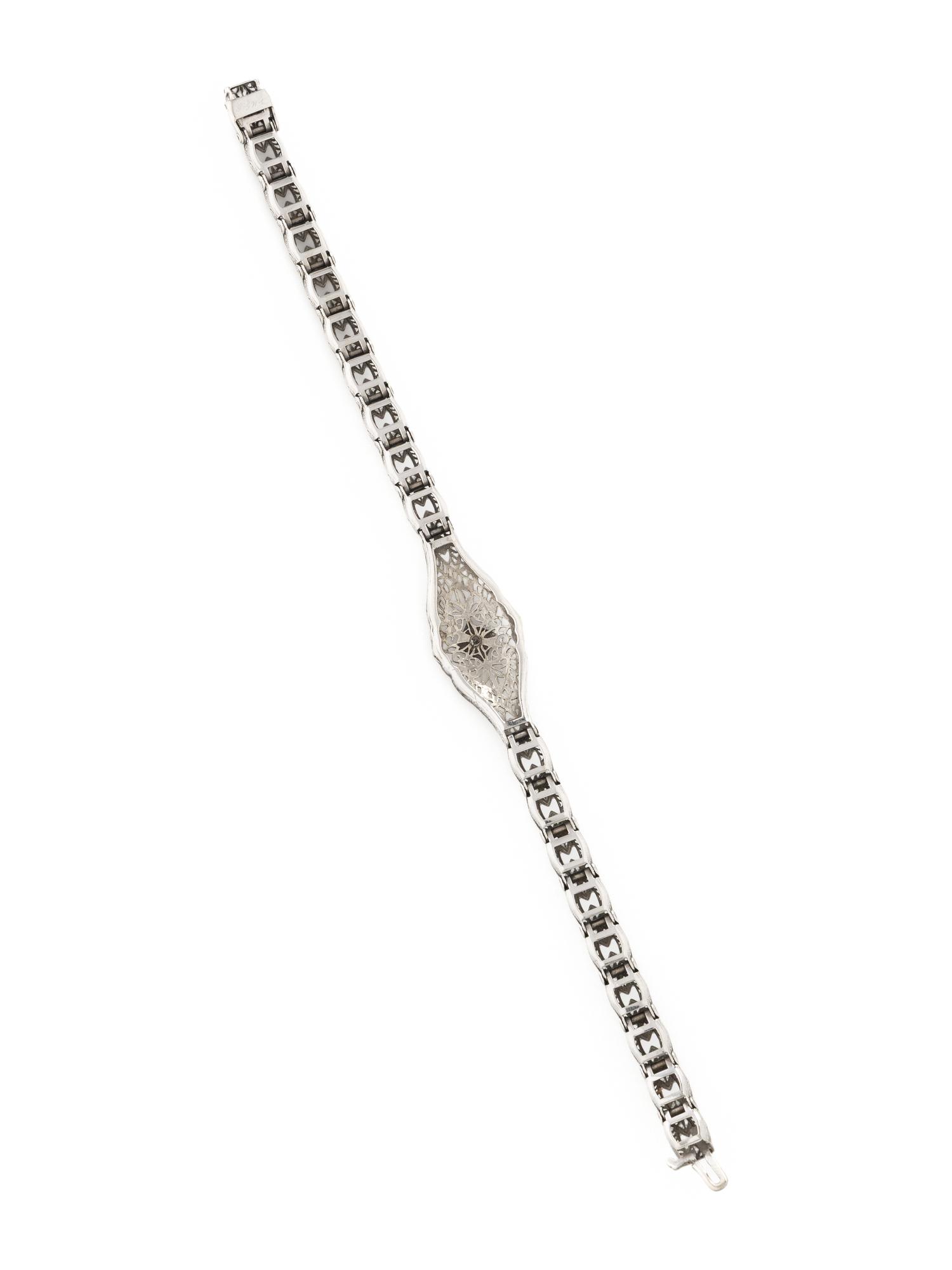 DIAMOND AND WHITE GOLD FILIGREE BRACELET