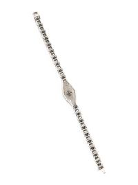 DIAMOND AND WHITE GOLD FILIGREE BRACELET