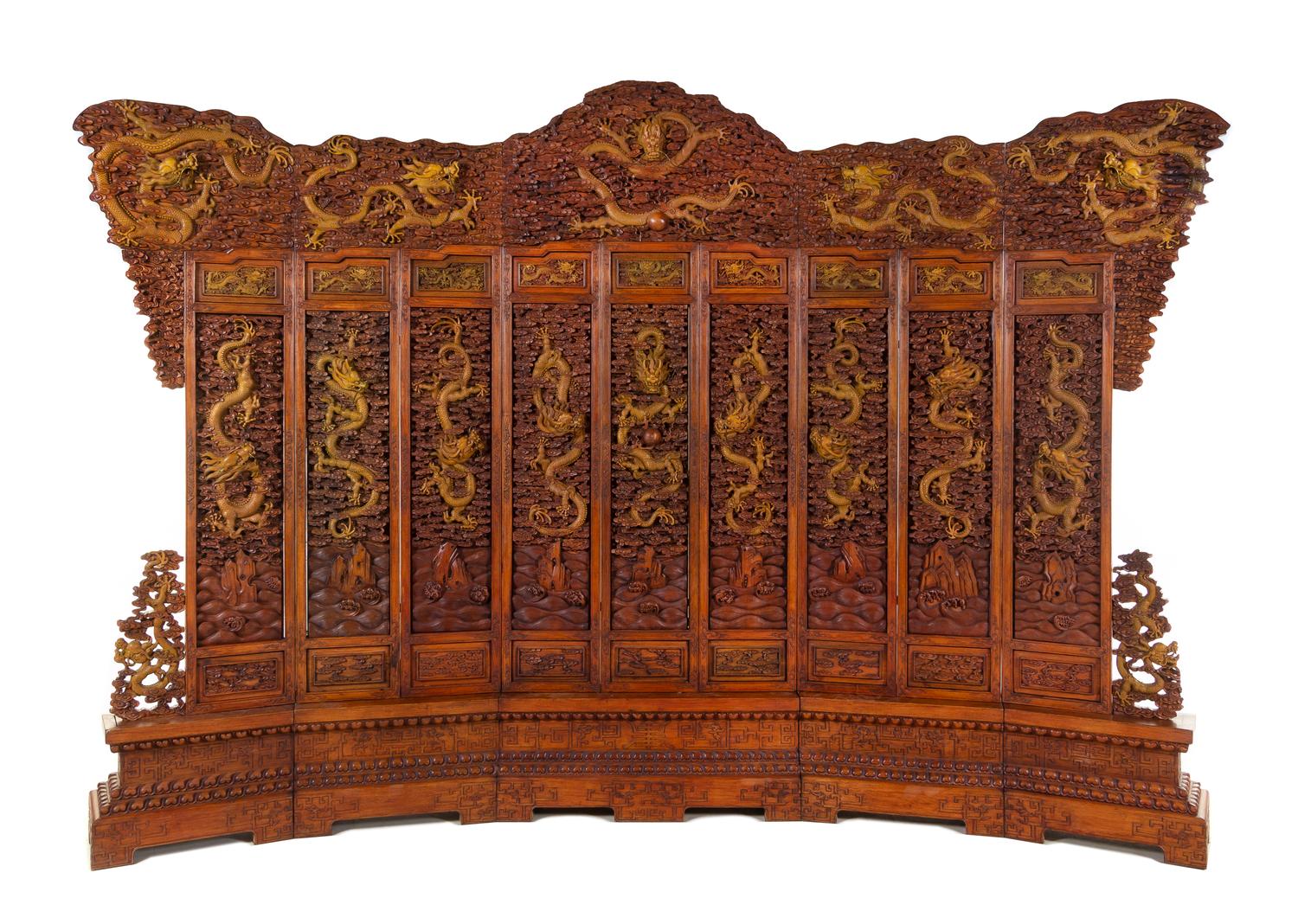 A Large Chinese Export Carved Hardwood 'Dragon and Clouds' Screen