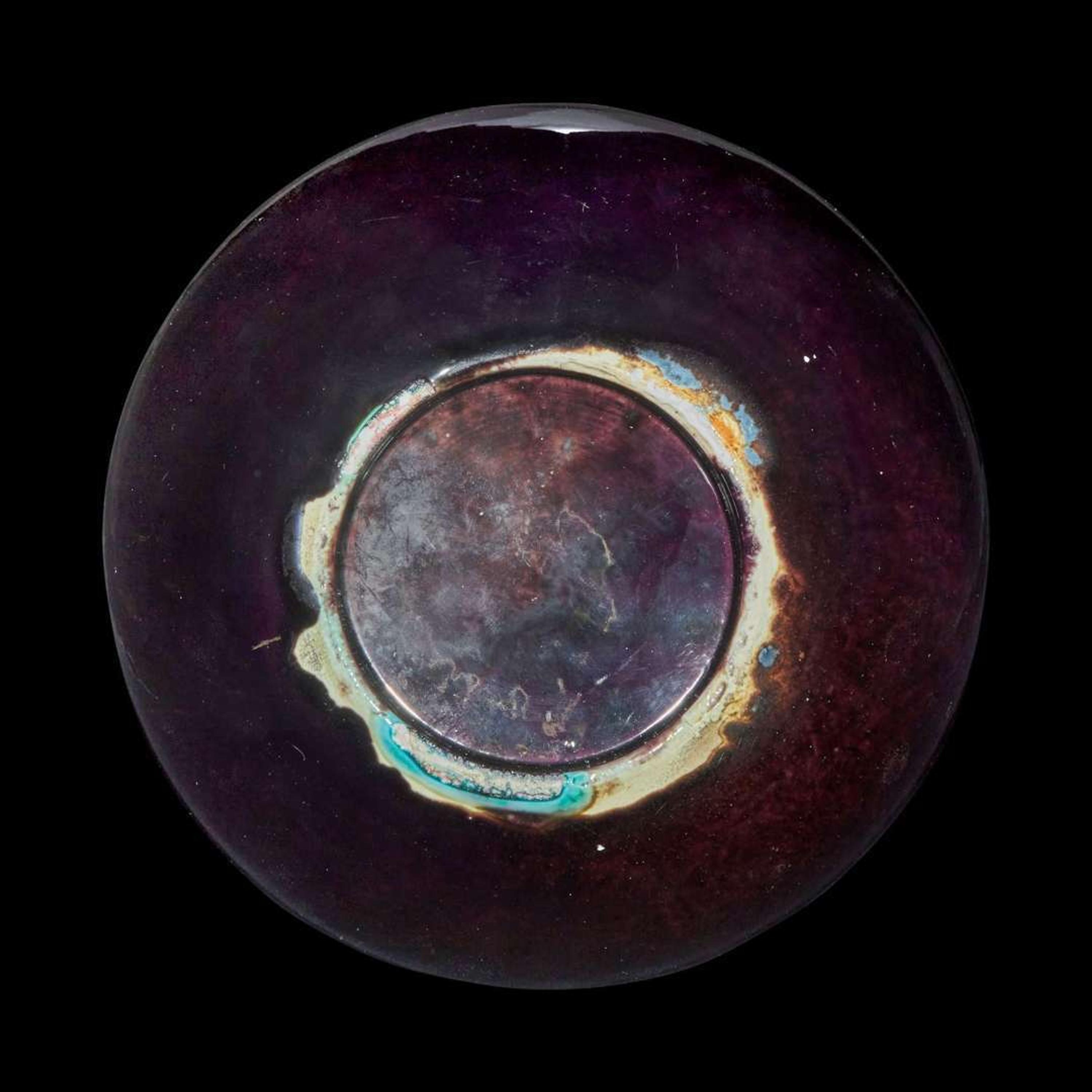 A Chinese aubergine-glazed porcelain bottle vase, Tianqiuping 茄皮紫天球瓶一只