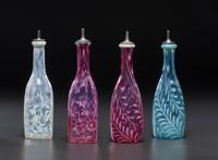 Four Fern Opalescent Glass Barber's Bottles