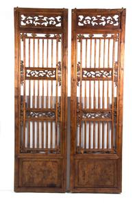 A Pair of Chinese Carved Wood Panels Height 67 x width 19 1/2 inches. — 20TH CENTURY