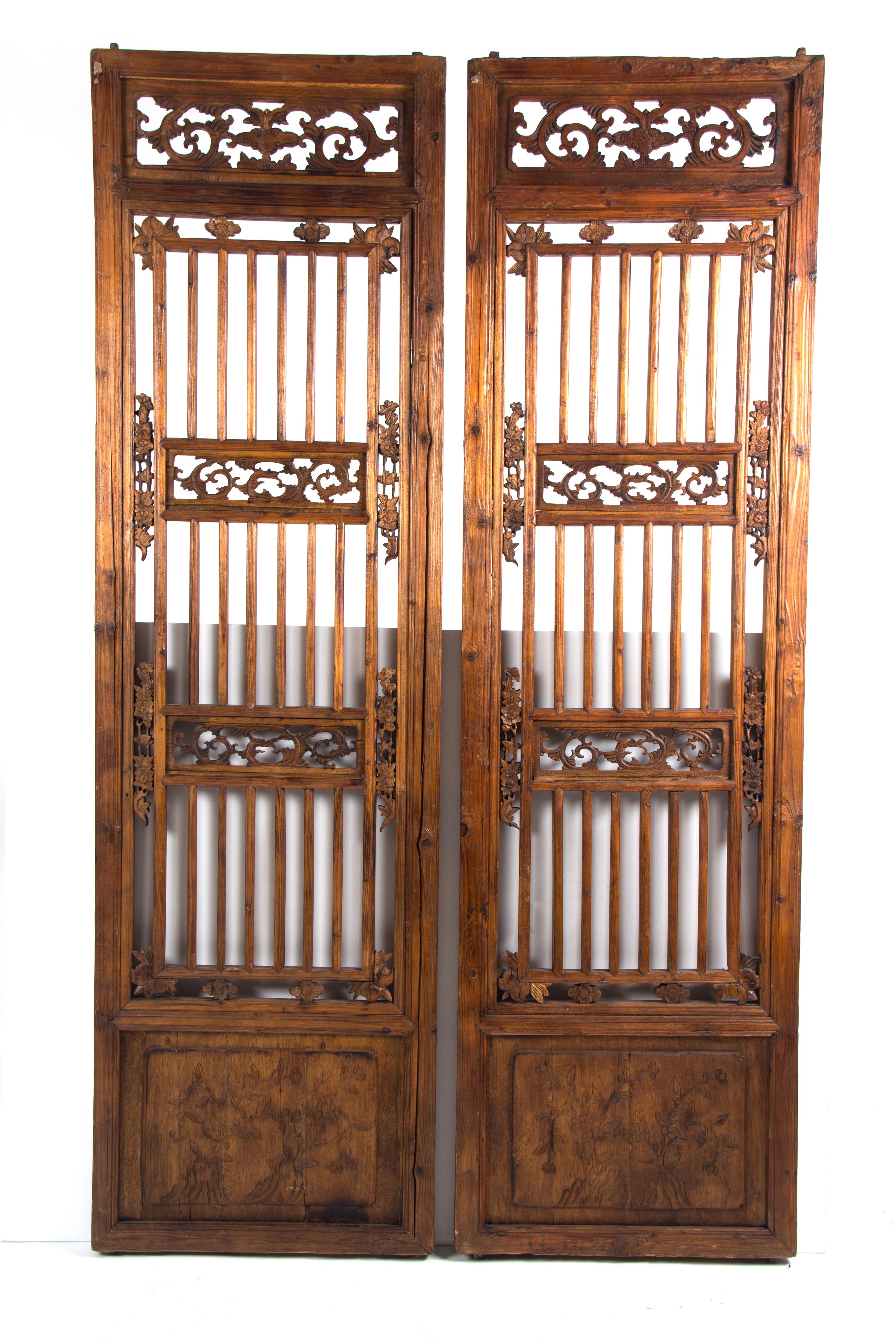 A Pair of Chinese Carved Wood Panels Height 67 x width 19 1/2 inches. — 20TH CENTURY