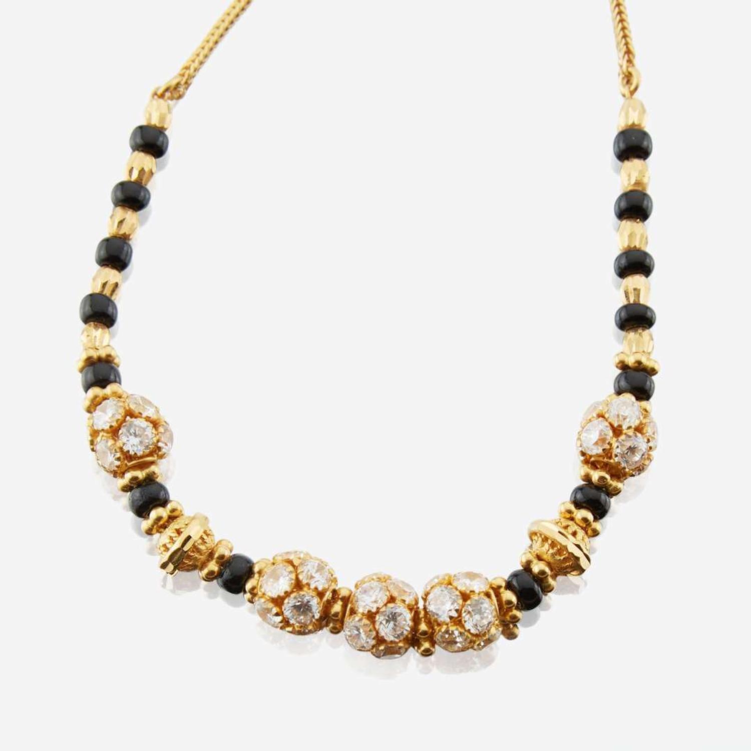 A collection of high karat gold jewelry