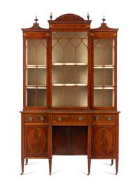 An Edwardian Inlaid Mahogany Breakfront Cabinet