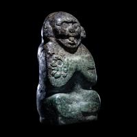 An Early Maya Stone Seated Deity