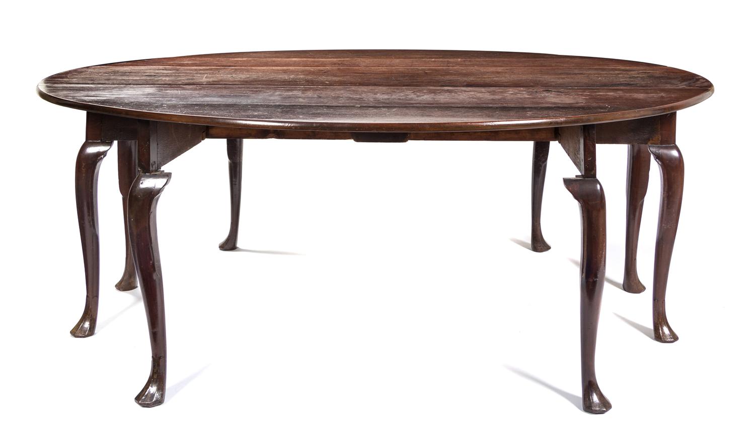 A Queen Anne Mahogany Drop-Leaf Table Height 28 7/8 x width 78 x depth 20 1/4 inches (closed). — 18TH/19TH CENTURY