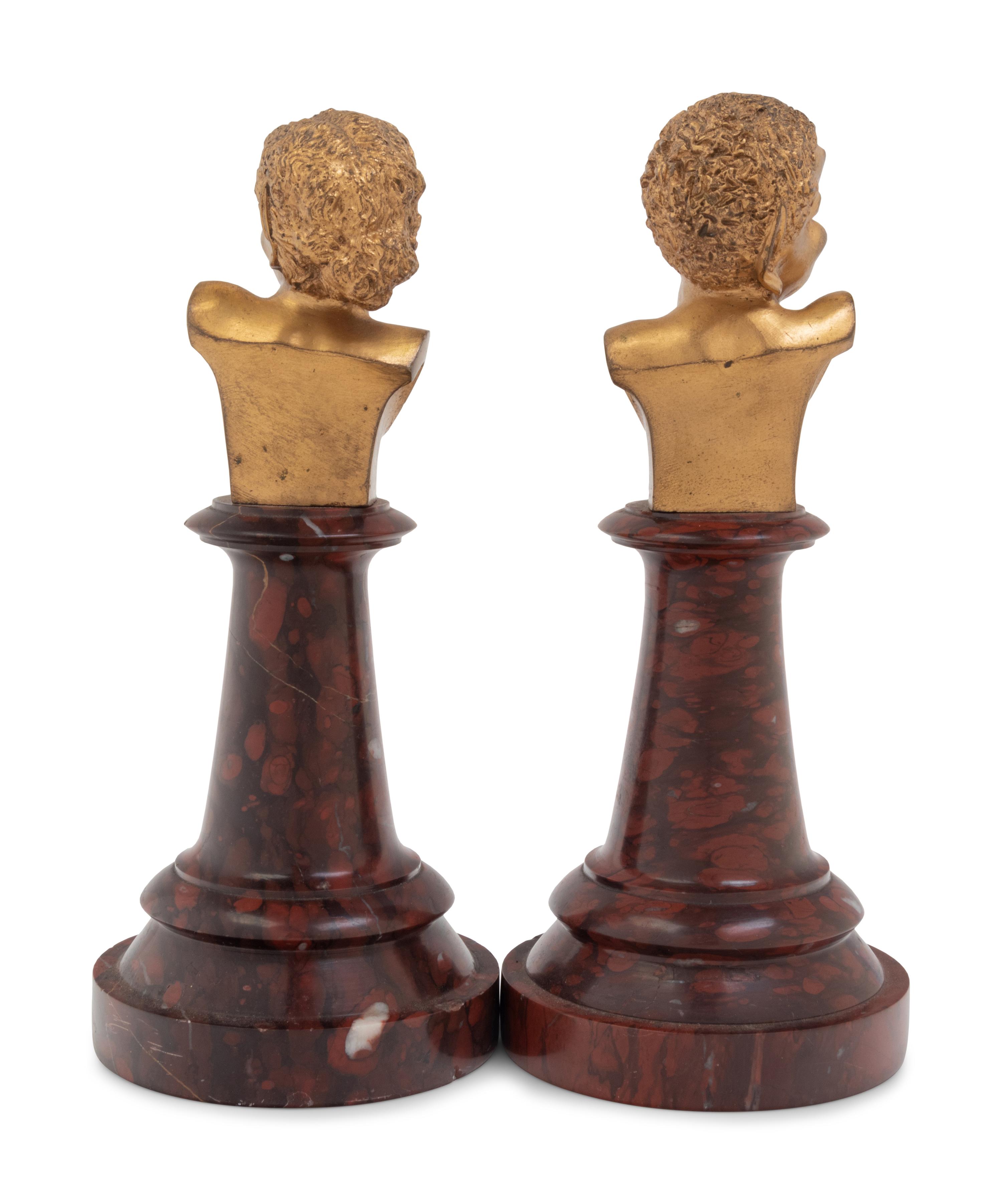 A Pair of French Gilt Bronze and Marble Busts