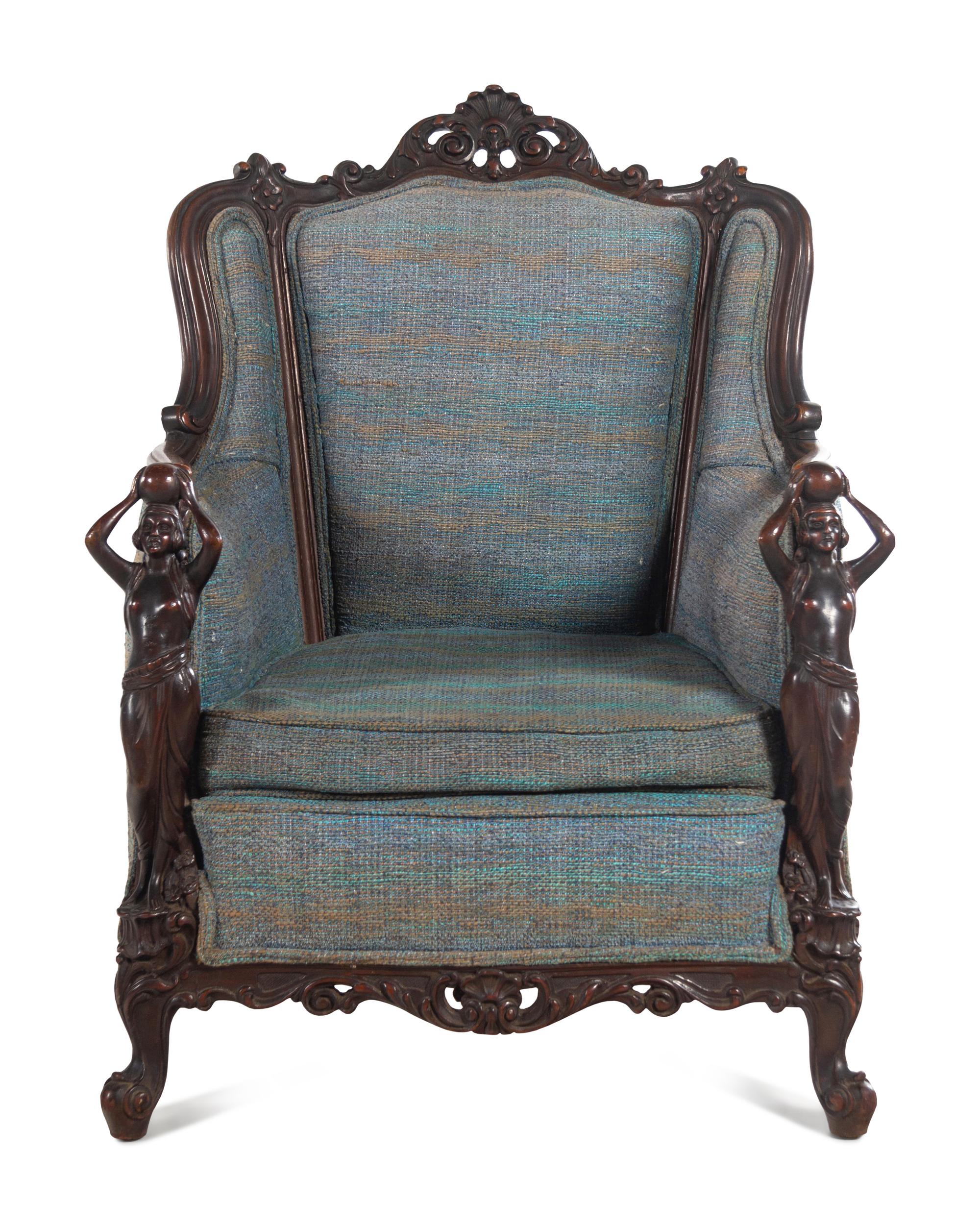 A Pair of Carved Walnut Armchairs in the Style of Karpen Bros.